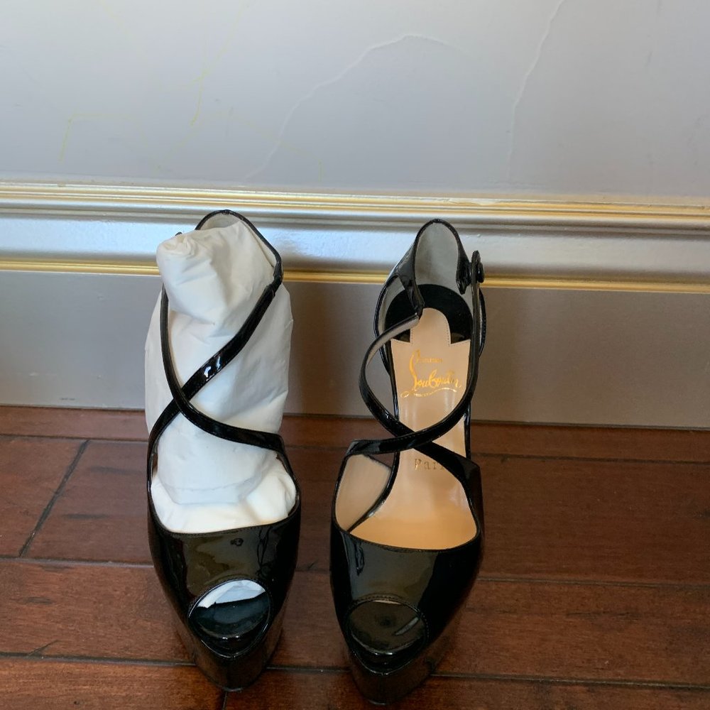 Black original Louboutin platform shoes